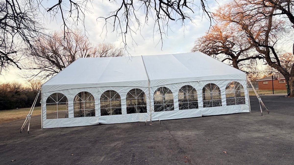 White frame party tent rental set up outdoors in DFW
